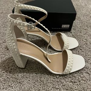 Brand new high heels, never worn. Originally $89.99